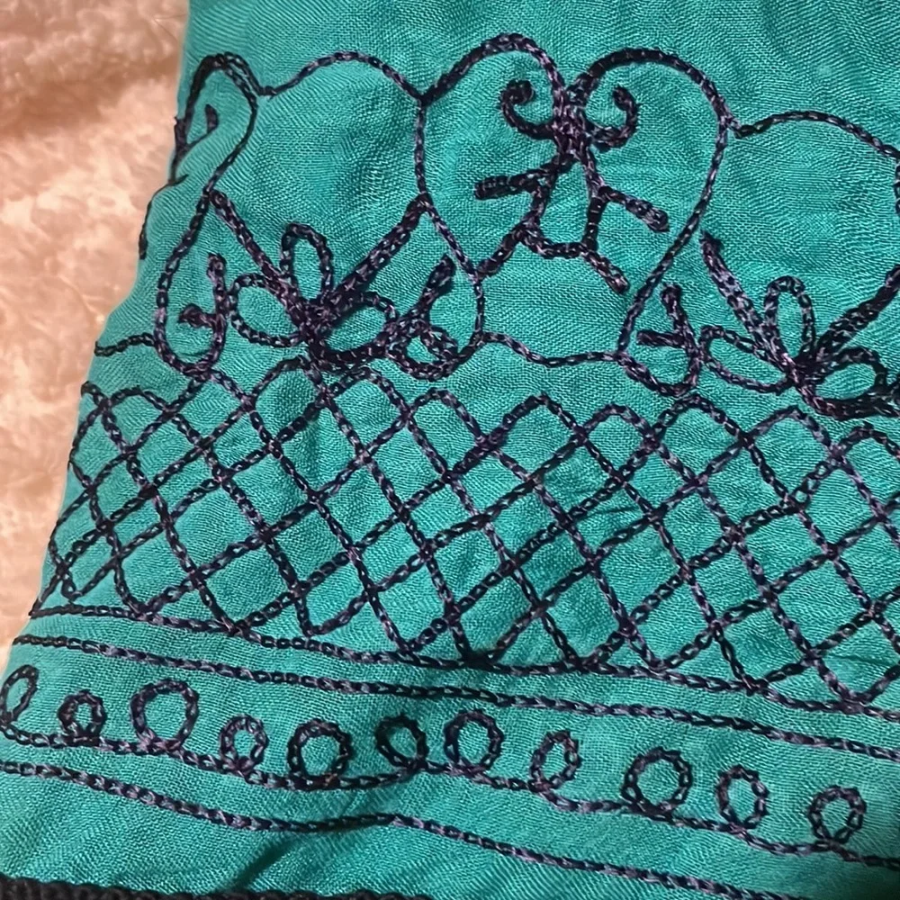 Teal and navy eternity scarf, navy embroidery and tassel details